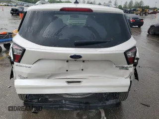 2018 Ford Escape Titanium z VIN 1FMCU9J94JUB49827, wystawiony jako Copart lot #55697385 z przebiegiem 98 682 mil mil oraz Szkoda całkowita • Salvage title. Historia ofert i sprzedaży dostępna na DreamBid. Obrazek 6.