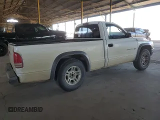 2002 Dodge Dakota with VIN 1B7FL16X02S714861, listed as a Copart auction lot 74093644 with 164,199 mi miles and Salvage Title. Bid and sale history available at DreamBid. Image 3.