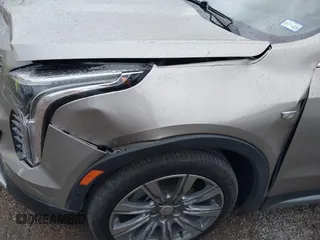 2022 Cadillac XT4 FWD Premium Luxury with VIN 1GYFZCR45NF164754, listed as a IAAI auction lot 41278705 with 65,698 mi miles. Bid and sale history available at carsss.com. Image 6.