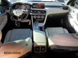 2023 Genesis G70 2.0T with VIN KMTG34TA5PU129955, listed as a Copart auction lot 82980774 with 12,625 mi miles and Salvage Title. Bid and sale history available at DreamBid. Image 8.
