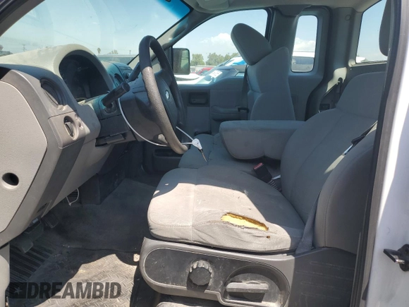 2007 Ford F-150 XL with VIN 1FTRF12W97KC18398, listed as a Copart auction lot 54759555 with 320,783 mi miles and Salvage title. Bid and sale history available at DreamBid. Image 7.