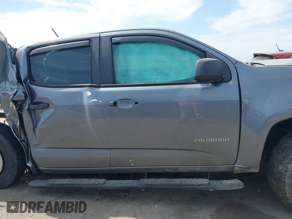 2018 Chevrolet Colorado 2WD Work Truck with VIN 1GCGSBEAXJ1294282, listed as a IAAI auction lot 42041416 with 57,191 mi miles and . Bid and sale history available at DreamBid. Image 13.