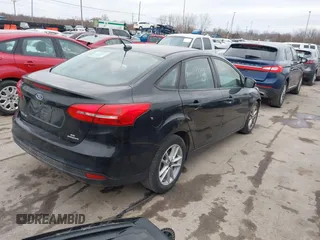 2015 Ford Focus SE with VIN 1FADP3F21FL355666, listed as a IAAI auction lot 41828579 with 110,002 mi miles. Bid and sale history available at carsss.com. Image 4.