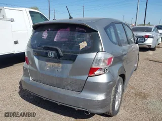 2009 Honda Fit Sport w/Navi with VIN JHMGE88619S020572, listed as a IAAI auction lot 41755126 with 202,358 mi miles. Bid and sale history available at carsss.com. Image 4.