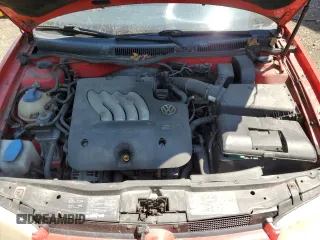1999 Volkswagen Golf z VIN WVWBC31J1XW357994, wystawiony jako Copart lot #60281374 z przebiegiem 102 806 mil mil oraz Szkoda całkowita • Salvage title. Historia ofert i sprzedaży dostępna na DreamBid. Obrazek 11.