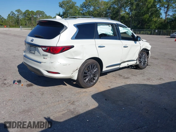 2020 Infiniti QX60 Luxe with VIN 5N1DL0MM3LC526479, listed as a IAAI auction lot 42044109 with 84,010 mi miles and . Bid and sale history available at DreamBid. Image 4.