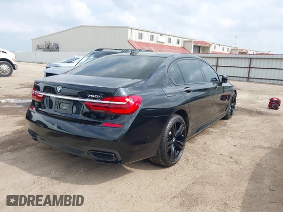 2017 BMW 7 Series 750i with VIN WBA7F0C55HGM21460, listed as a IAAI auction lot 41934198 with 58,206 mi miles and . Bid and sale history available at DreamBid. Image 4.