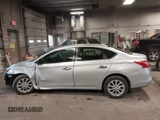 2019 Nissan Sentra S z VIN 3N1AB7AP7KY345072, wystawiony jako IAAI lot #41284957 z przebiegiem 104 084 mil mil oraz . Historia ofert i sprzedaży dostępna na DreamBid. Obrazek 15.