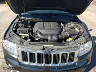 2011 Jeep Grand Cherokee Laredo with VIN 1J4RR4GG6BC572080, listed as a Copart auction lot 50358405 with 147,188 mi miles and Salvage Title. Bid and sale history available at carsss.com. Image 12.