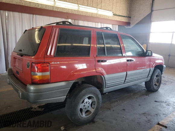 1997 Jeep Grand Cherokee Laredo with VIN 1J4GZ58SXVC723703, listed as a Copart auction lot 89216845 with 247,398 mi miles and Clean Title. Bid and sale history available at carsss.com. Image 3.