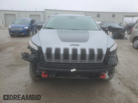 2014 Jeep Cherokee Trailhawk with VIN 1C4PJMBS1EW240177, listed as a Copart auction lot 43321715 with 212,339 mi miles and Salvage title. Bid and sale history available at DreamBid. Image 5.