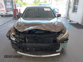 2015 Infiniti Q50 Premium with VIN JN1BV7AP4FM330386, listed as a IAAI auction lot 42028771 with 75,533 mi miles. Bid and sale history available at carsss.com. Image 13.