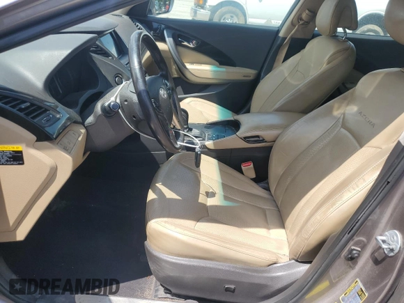 2013 Hyundai Azera z VIN KMHFG4JG4DA240690, wystawiony jako Copart lot #57465565 z przebiegiem 164 757 mil mil oraz Szkoda całkowita • Salvage title. Historia ofert i sprzedaży dostępna na DreamBid. Obrazek 7.