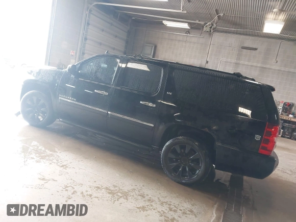 2010 Chevrolet Suburban LTZ with VIN 1GNUKKE39AR106851, listed as a IAAI auction lot 41994155 with 148,776 mi miles. Bid and sale history available at carsss.com. Image 3.