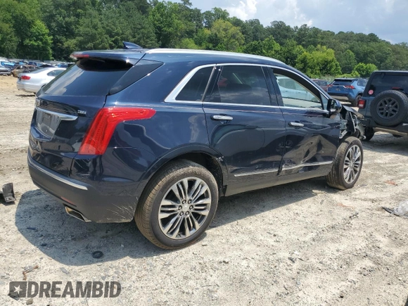 2017 Cadillac XT5 Premium Luxury AWD with VIN 1GYKNERS0HZ239805, listed as a Copart auction lot 61257435 with 104,448 mi miles and Salvage title. Bid and sale history available at DreamBid. Image 3.