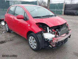 2009 Toyota Yaris with VIN JTDKT903695223495, listed as a IAAI auction lot 41873059 with 141,078 mi miles. Bid and sale history available at carsss.com. Image 1.