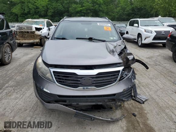 2012 Kia Sportage LX z VIN KNDPB3A20C7217165, wystawiony jako Copart lot #60999525 z przebiegiem 128 231 mil mil oraz Szkoda całkowita • Salvage title. Historia ofert i sprzedaży dostępna na DreamBid. Obrazek 5.