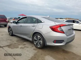 2018 Honda Civic EX-L z VIN JHMFC1F7XJX029864, wystawiony jako Copart lot #59989035 z przebiegiem 43 318 mil mil oraz Szkoda całkowita • Salvage title. Historia ofert i sprzedaży dostępna na DreamBid. Obrazek 2.