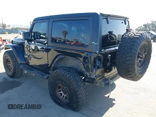 2018 Jeep Wrangler Sport with VIN 1C4GJXANXJW302523, listed as a IAAI auction lot 42527455 with 101,320 mi miles and . Bid and sale history available at DreamBid. Image 3.