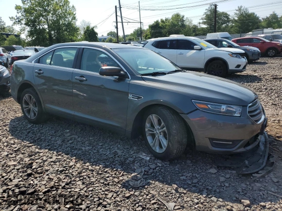 2016 Ford Taurus SEL with VIN 1FAHP2E87GG134004, listed as a Copart auction lot 59764905 with 145,169 mi miles and Salvage title. Bid and sale history available at DreamBid. Image 4.