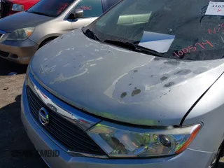 2014 Nissan Quest S with VIN JN8AE2KP6E9100574, listed as a IAAI auction lot 41658656 with 137,335 mi miles. Bid and sale history available at carsss.com. Image 6.