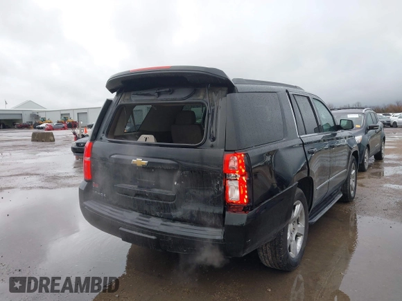 2015 Chevrolet Tahoe LT with VIN 1GNSCBKC2FR632139, listed as a IAAI auction lot 41553087 with 142,775 mi miles and . Bid and sale history available at DreamBid. Image 6.