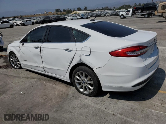 2017 Ford Fusion Hybrid SE with VIN 3FA6P0LUXHR171876, listed as a Copart auction lot 56241855 with 197,846 mi miles and Salvage title. Bid and sale history available at DreamBid. Image 2.