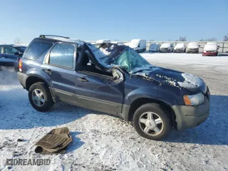 2003 Ford Escape XLS Popular with VIN 1FMYU02113KE14938, listed as a Copart auction lot 87553835 with 249,149 mi miles and Salvage Title. Bid and sale history available at carsss.com. Image 4.