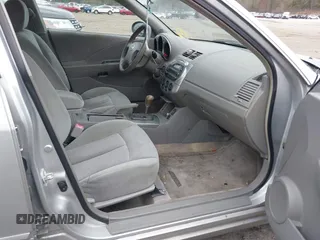 2003 Nissan Altima S with VIN 1N4AL11D33C265538, listed as a IAAI auction lot 42082079 with 180,138 mi miles. Bid and sale history available at carsss.com. Image 5.
