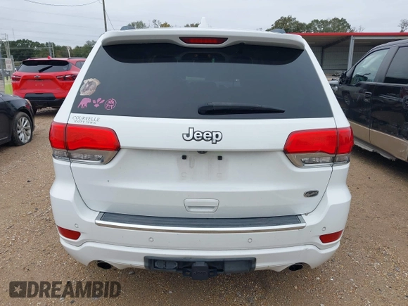 2014 Jeep Grand Cherokee Overland with VIN 1C4RJECG4EC543092, listed as a IAAI auction lot 40981315 with 149,096 mi miles. Bid and sale history available at carsss.com. Image 17.