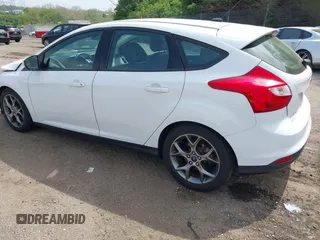 2014 Ford Focus SE with VIN 1FADP3K25EL251024, listed as a IAAI auction lot 42123157 with 74,311 mi miles and . Bid and sale history available at carsss.com. Image 3.