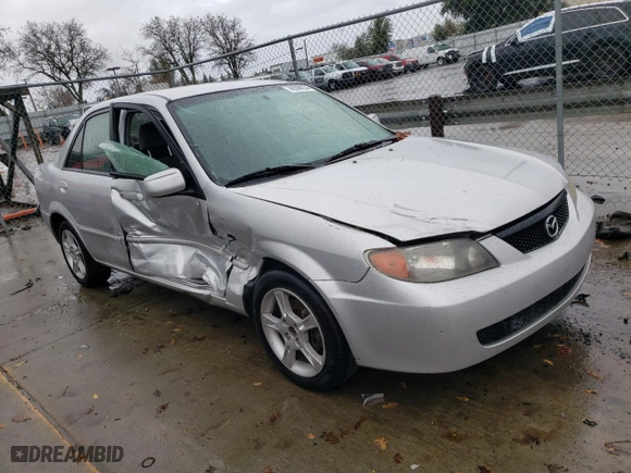 2003 Mazda Protege DX with VIN JM1BJ225731208014, listed as a Copart auction lot 86568234 with 275,867 mi miles and Salvage Title. Bid and sale history available at carsss.com. Image 4.
