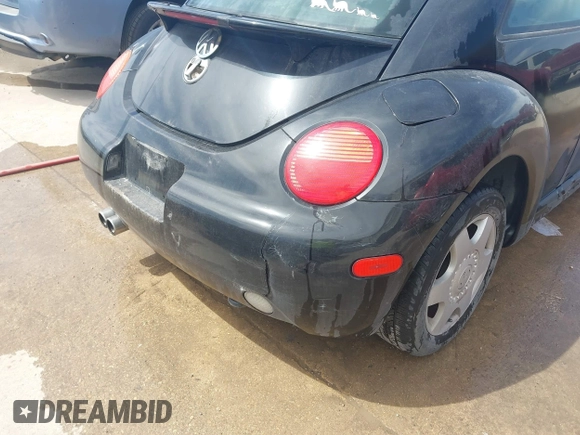 1999 Volkswagen Beetle GLS z VIN 3VWCA21C2XM404338, wystawiony jako IAAI lot #41606143 z przebiegiem 192 205 mil mil oraz . Historia ofert i sprzedaży dostępna na DreamBid. Obrazek 6.