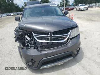 2017 Dodge Journey SXT z VIN 3C4PDCBG9HT515799, wystawiony jako Copart lot #62827975 z przebiegiem 156 215 mil mil oraz Szkoda całkowita • Salvage title. Historia ofert i sprzedaży dostępna na DreamBid. Obrazek 5.
