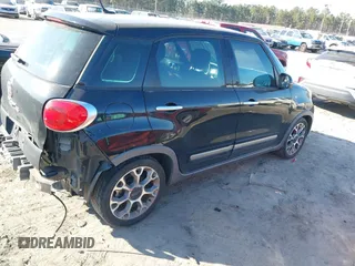 2014 FIAT 500L Trekking with VIN ZFBCFADH1EZ009720, listed as a IAAI auction lot 41497877 with 99,448 mi miles and . Bid and sale history available at DreamBid. Image 4.