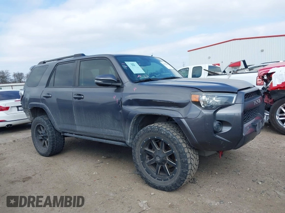 2015 Toyota 4Runner SR5 with VIN JTEZU5JRXF5091016, listed as a IAAI auction lot 41592829 with 196,988 mi miles and . Bid and sale history available at DreamBid. Image 13.
