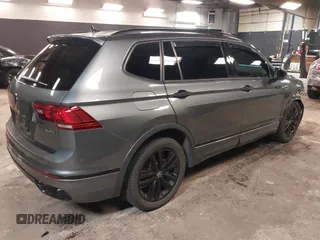 2022 Volkswagen Tiguan SE R-Line Black with VIN 3VV8B7AX1NM111194, listed as a IAAI auction lot 42254124 with 22,748 mi miles and . Bid and sale history available at DreamBid. Image 4.