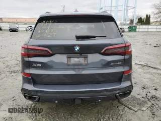 2021 BMW X5 z VIN NJ1541E, wystawiony jako Copart lot #37990264 z przebiegiem 18 321 mil mil oraz Szkoda całkowita • Salvage title. Historia ofert i sprzedaży dostępna na DreamBid. Obrazek 6.