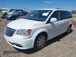 2014 Chrysler Town & Country Touring with VIN 2C4RC1BG9ER148966, listed as a IAAI auction lot 41886625 with 104,299 mi miles. Bid and sale history available at carsss.com. Image 2.