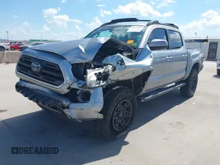 2018 Toyota Tacoma SR with VIN 3TMCZ5AN2JM172829, listed as a IAAI auction lot 42073847 with 136,671 mi miles and . Bid and sale history available at carsss.com. Image 2.