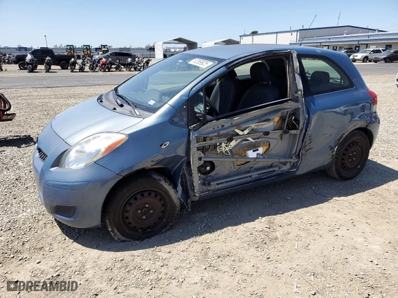 2009 Toyota Yaris with VIN JTDJT903995238147, listed as a Copart auction lot 52369925 with 124,921 mi miles and Salvage Title. Bid and sale history available at carsss.com. Image 1.