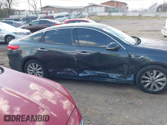 2016 Kia Optima EX with VIN 5XXGU4L30GG014019, listed as a IAAI auction lot 41786540 with 112,894 mi miles and . Bid and sale history available at carsss.com. Image 13.
