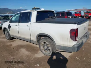 2020 Honda Ridgeline RTL with VIN 5FPYK3F50LB028430, listed as a IAAI auction lot 42033090 with Not provided miles and . Bid and sale history available at DreamBid. Image 3.