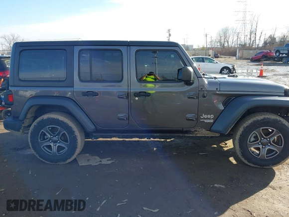 2018 Jeep Wrangler Unlimited Sport S with VIN 1C4HJXDN0JW255003, listed as a IAAI auction lot 41528394 with 55,660 mi miles and . Bid and sale history available at DreamBid. Image 14.