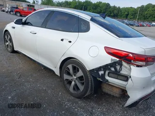 2016 Kia Optima SX Turbo z VIN 5XXGW4L20GG016368, wystawiony jako IAAI lot #42610152 z przebiegiem 165 525 mil mil oraz . Historia ofert i sprzedaży dostępna na DreamBid. Obrazek 14.
