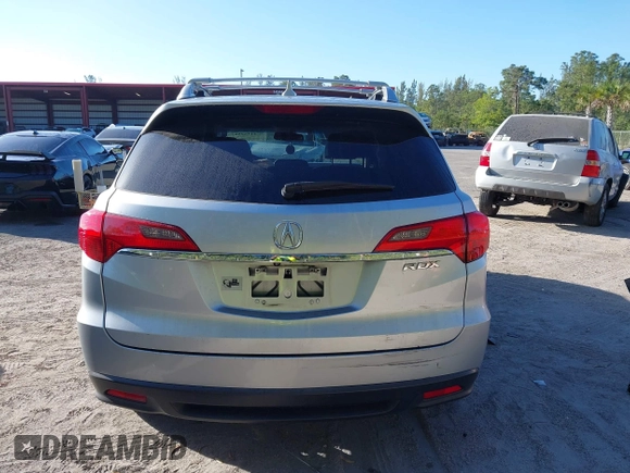 2014 Acura RDX Tech Pkg with VIN 5J8TB3H50EL014951, listed as a IAAI auction lot 41562583 with 129,833 mi miles. Bid and sale history available at carsss.com. Image 16.