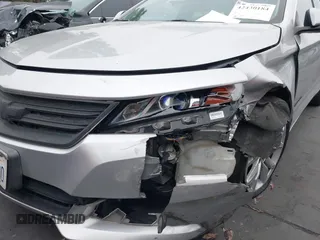2016 Chevrolet Impala LT with VIN 2G1105SA5G9185565, listed as a IAAI auction lot 42430184 with 143,791 mi miles and . Bid and sale history available at DreamBid. Image 19.