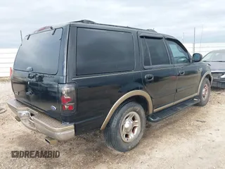 1998 Ford Expedition XLT with VIN 1FMRU17L4WLB39665, listed as a IAAI auction lot 41504254 with 328,171 mi miles. Bid and sale history available at carsss.com. Image 4.