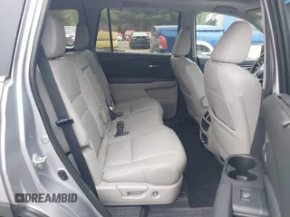 2020 Honda Pilot Touring 8-Passenger z VIN 5FNYF6H91LB042626, wystawiony jako IAAI lot #42249440 z przebiegiem 57 429 mil mil oraz . Historia ofert i sprzedaży dostępna na DreamBid. Obrazek 8.