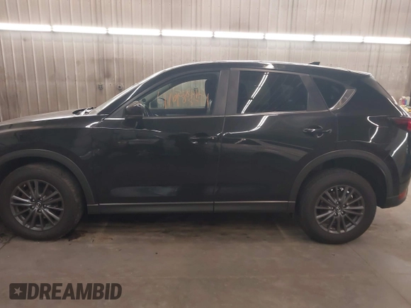 2020 Mazda CX-5 Touring with VIN JM3KFBCM9L1785125, listed as a IAAI auction lot 41983561 with 101,062 mi miles and . Bid and sale history available at carsss.com. Image 15.